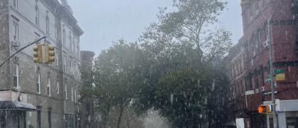 Heavy rain falls on the corner of Seventh Avenue and 5th Street at around 12:30 p.m. in Park Slope, Brooklyn.